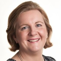 woman looking at the camera and smiling
